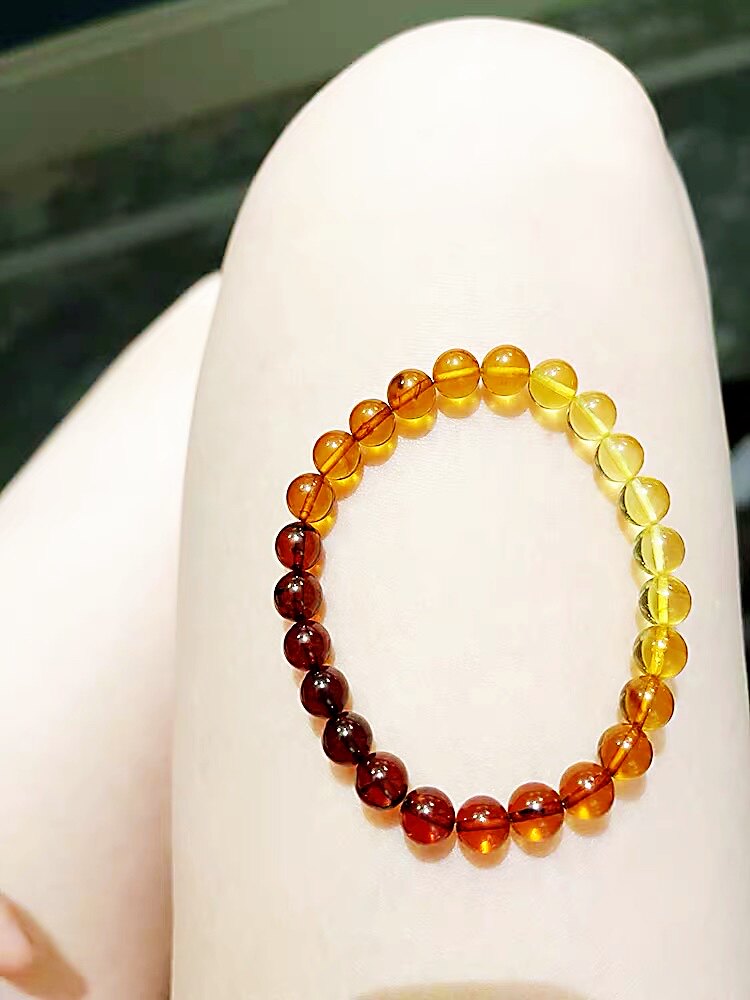 The world is another year to raise your hand to see the rainbow 2021 New Year's Fengshui big welfare rainbow Amber transfer bracelet