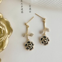 The flower in the story Camellia tea series mosquito coil ear clip without ear hole female spiral design earrings earrings