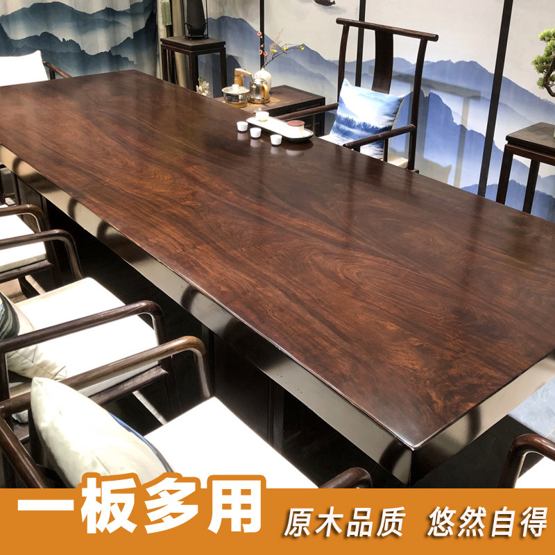 Ebony solid wood large plate tea table natural edge black log tea table modern minimalist complete set of new Chinese furniture business