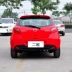 Thích hợp cho Mazda 2 cản trước và cản sau Jinxiang thanh nguyên bản hatchback sedan xe nguyên bản thanh bảo vệ xe lớn bao quanh biểu tượng ô tô đèn bi led gầm ô tô 