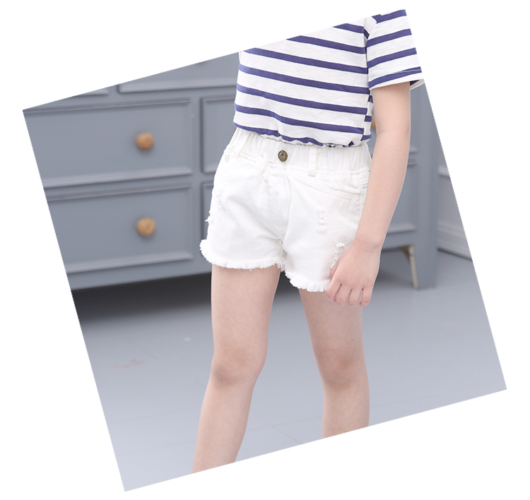 Quần áo trẻ em 2018 cô gái màu rắn lỗ quần short denim trẻ em mới thường hoang dã quần nóng thủy triều