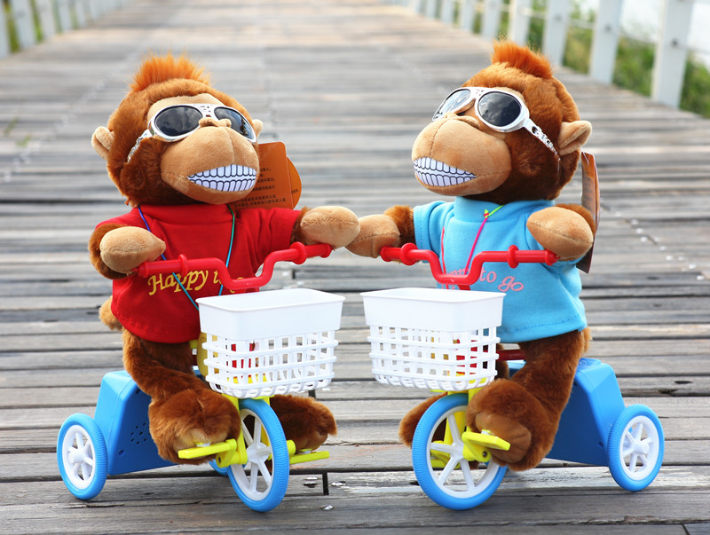 Jia Meng mới đồ chơi sang trọng chó điều khiển từ xa cưỡi lừa nhỏ cưỡi ba ​​bánh xe đạp lợn khỉ quà tặng đồ chơi giáo dục