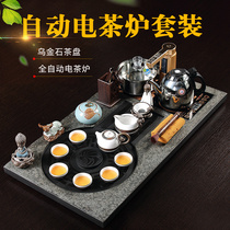 Haopin natural whole black gold stone tea tray tea set Four-in-one household Ge kiln set large induction cooker