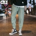 Châu Âu và Hoa Kỳ Thời trang đường phố Nhật Bản overalls nam giản dị retro quần harem quần lỏng chùm quần xanh quân đội quần áo nam Quần Harem
