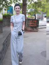 Gray fashionable casual sports suit for women Korean style simple shoulder slim short-sleeved T-shirt trousers early summer two-piece set