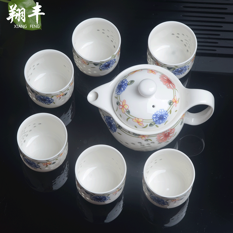 Xiang feng and exquisite tea sets suit of blue and white porcelain honeycomb hollow ceramic kung fu tea teapot teacup tea sea capacity