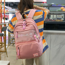 Korean version of the large capacity junior high school girls backpack 3-4-5-6th grade schoolboy school bag girl joker backpack