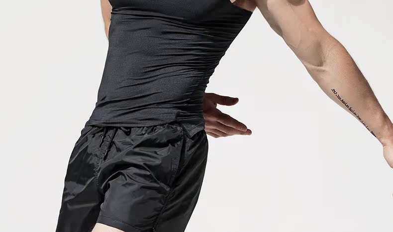 Quần vest bó sát màu đen Mới tập thể dục thấm mồ hôi và quần áo thể thao nhanh khô áo thể dục chấm com