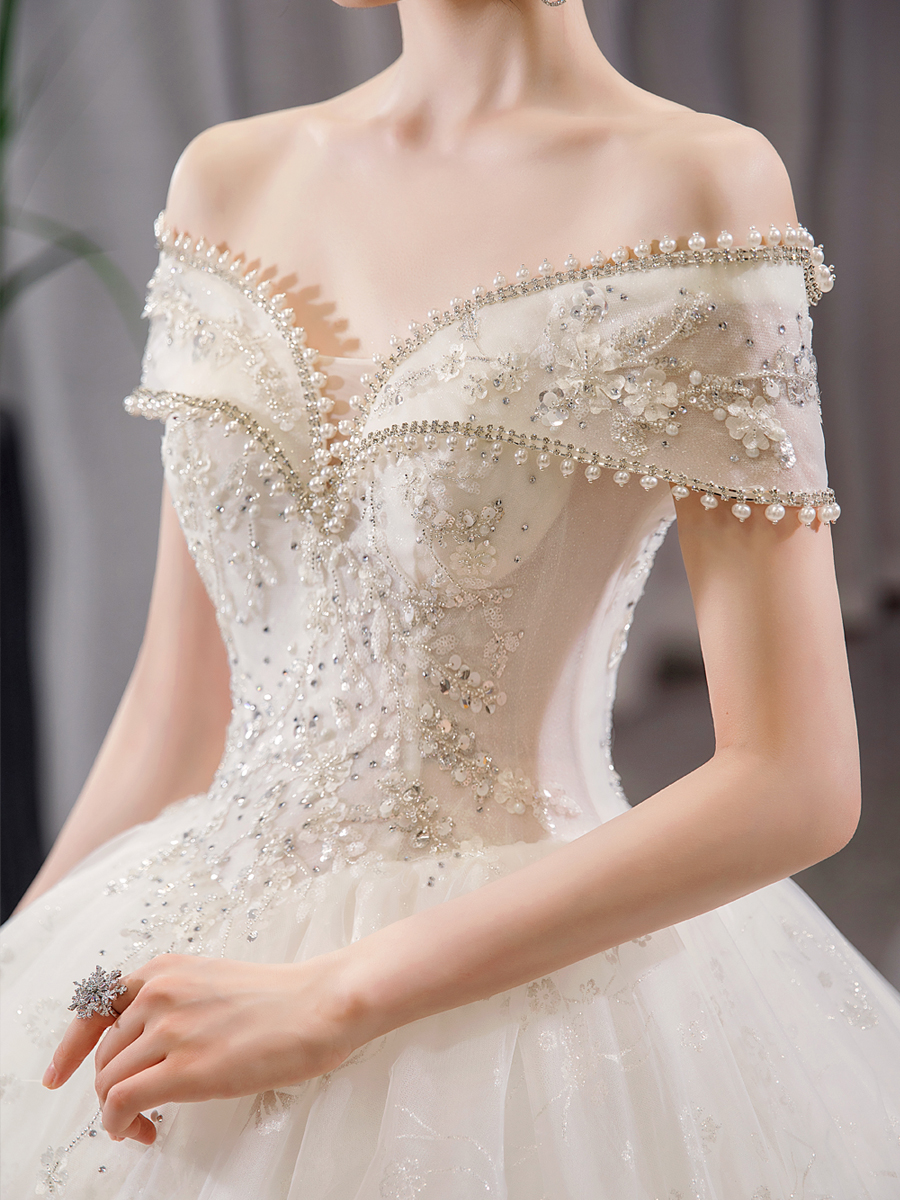 White wedding dress, open shoulders, 2021 collection