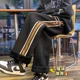 Утепленные дизайнерские демисезонные джинсы с начесом, бархатные штаны для отдыха, тренд сезона, свободный прямой крой, в американском стиле