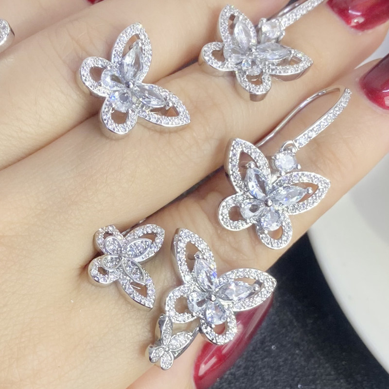 Marry light extravagant DE suit S925 silver pin full drill butterfly ear nail imitation Mossan fashion personality Three-butterfly ring