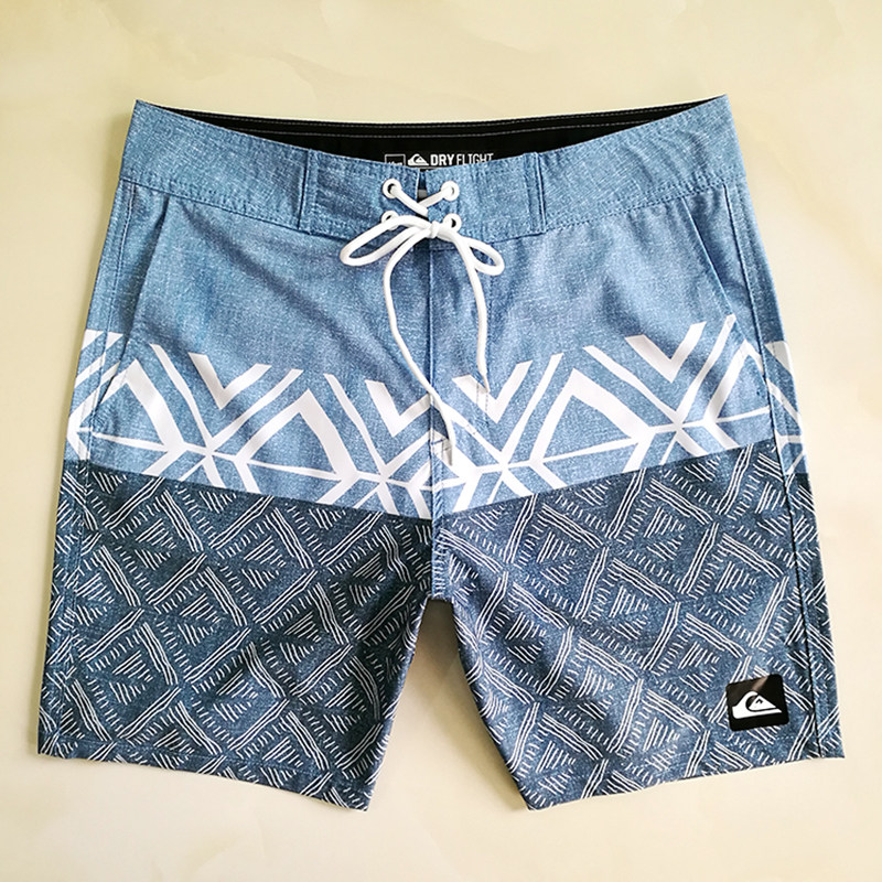 New foreign trade beach pants men's summer loose casual shorts speed dry surf swimming big size 50% shorts