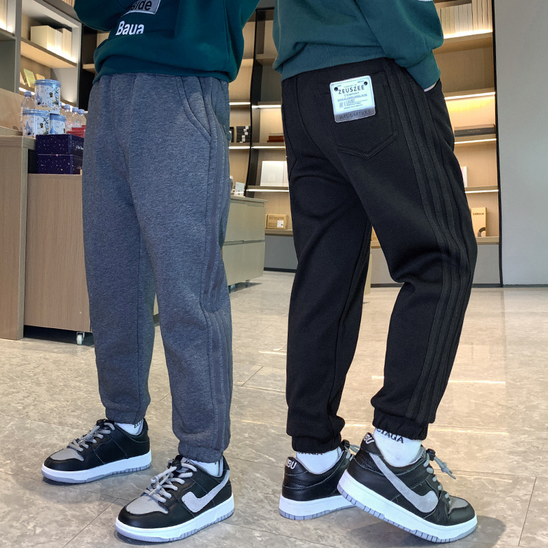 Boy Pants 2022 Spring Autumn Season New CUHK Child Han Version Long Pants Casual Pants Foreign Pants Children Sports Pants