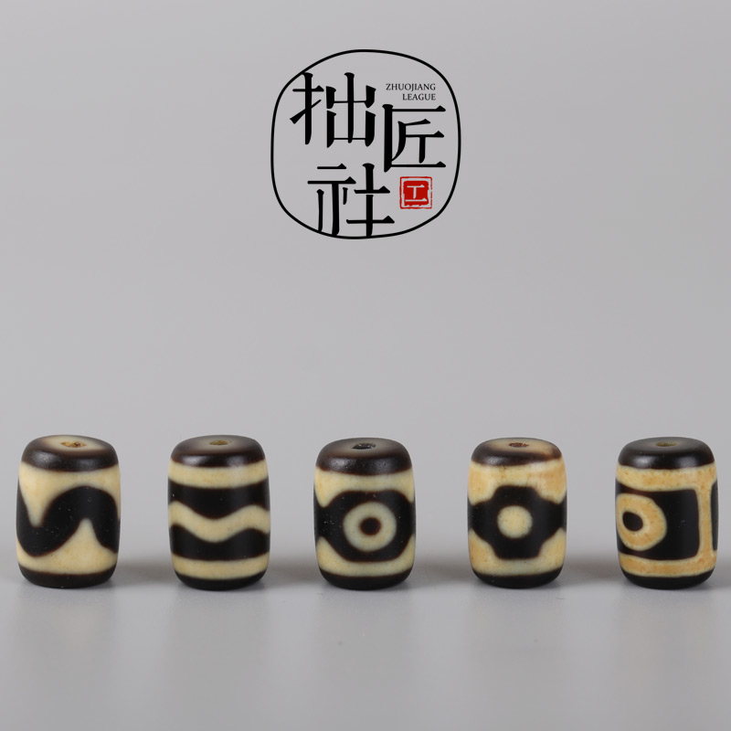 藏传西藏天珠中的两眼三眼虎牙水纹天珠有何区别？它们的价值如何