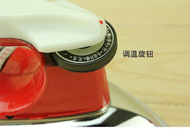 Trang chủ trái tim đỏ cổ điển sắt điện công nghiệp nhà 700W nhiệt sắt sắt khô loại không hơi nước YK3-70D 	bàn ủi electrolux esi5126	
