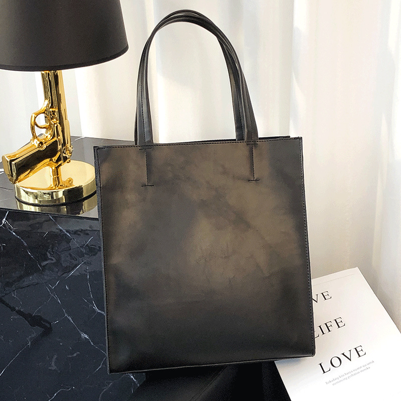 Hong Kong's new men's business handbag trendy black cow leather casual bag vertical paper bag briefcase briefcase