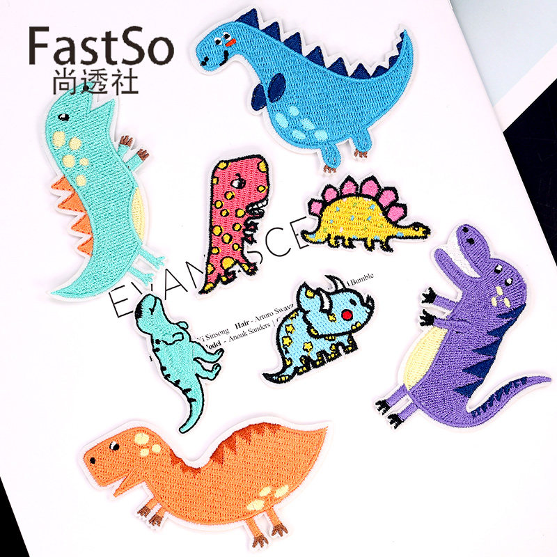 Cartoon embroidered with children cloth with a broken hole and a fashion ironing canvas sticking a dongle to patch a broken hole applie