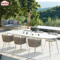 Nordic outdoor leisure creative combination rattan table and chair high-end villa courtyard garden hotel waterproof table and chair combination