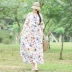 Năm 2020 mùa xuân và mùa hè mới của phụ nữ phong cách dân tộc váy cotton và vải lanh in váy cổ tròn eo cao váy dài thướt tha - Váy eo cao