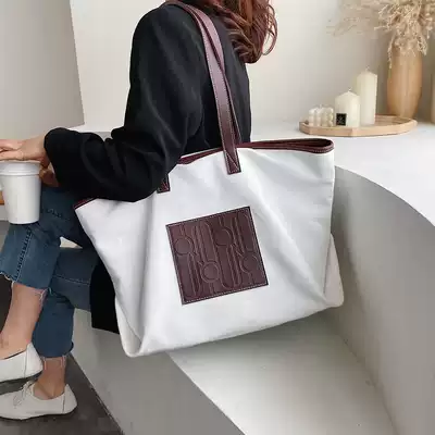 Hong Kong trendy brand net red simple big bag female 2021 new large-capacity fashion canvas portable totter shoulder bag