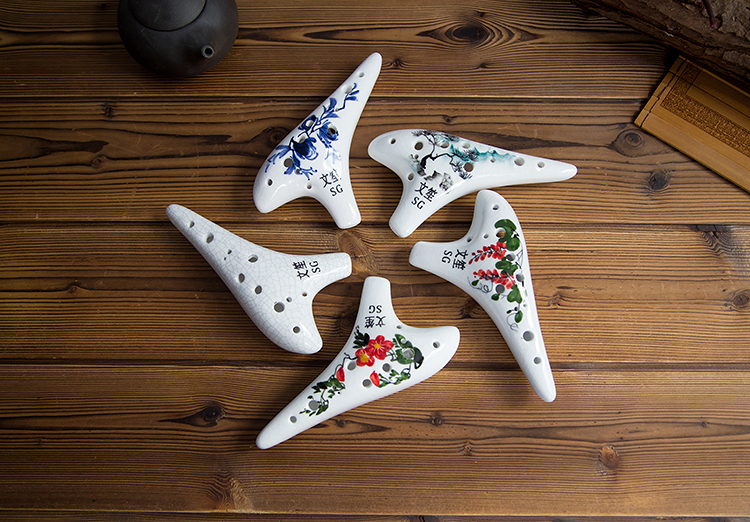 Người mới bắt đầu Ocarina 12 lỗ treble G / SG Ocarina 12 lỗ âm ỉ Sinh viên Ocarina gửi phụ kiện nhạc cụ - Nhạc cụ dân tộc mua đàn nguyệt
