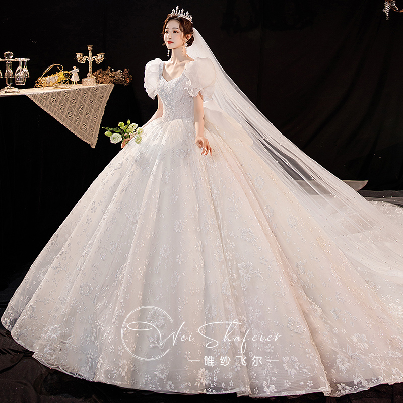 Bubble sleeve wedding dress at the escape princess 2023 new bride main yarn drag tail super heavy industry super - heavy little man