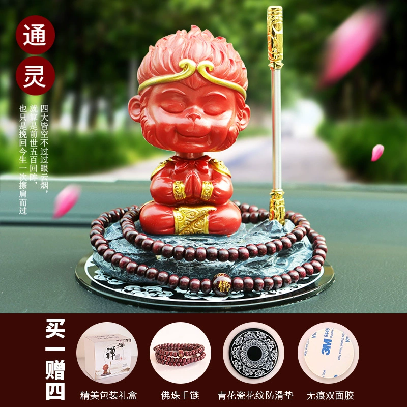Ô tô trang trí nội thất lưới màu đỏ sáng tạo lắc đầu khỉ nhỏ Monkey King Qitian Dasheng ô tô bảng điều khiển trung tâm ô tô - Vòng đeo tay Clasp