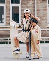 Longboard skateboarding teaching adult children and teenagers