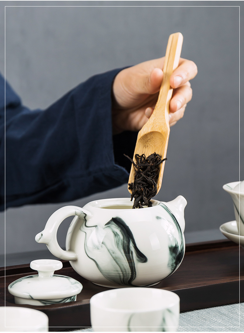 Building In hand - made kung fu tea set household contracted blue and white porcelain ceramic dehua white porcelain tea set. A complete set of tea cups