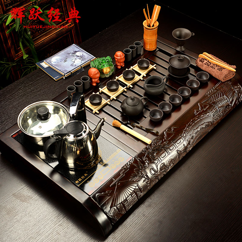 Fai jump a whole piece of ebony wood tea tray was kung fu tea set induction cooker purple sand tea tea tea