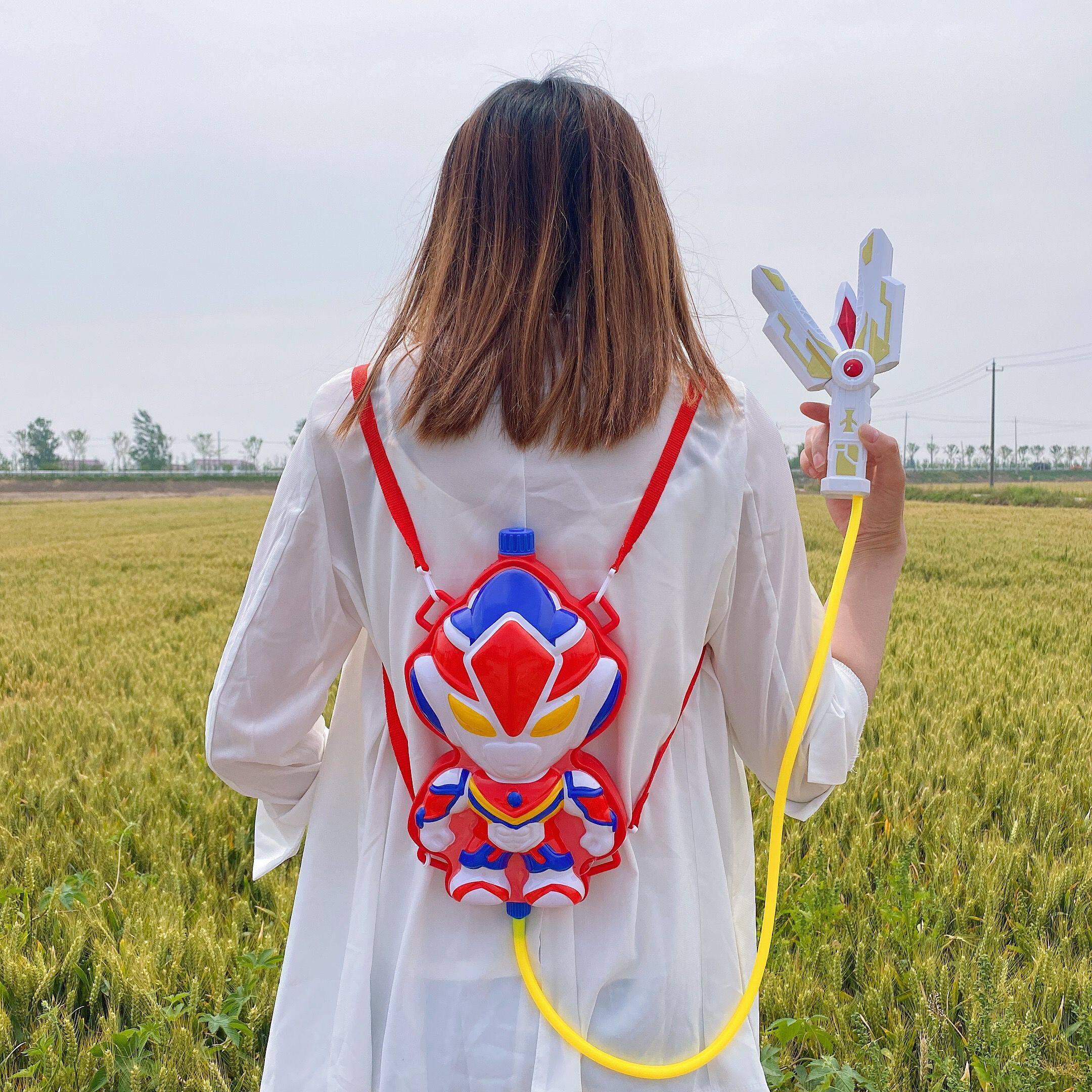 2022 New Kids Little Boy Transformer Ultraman Universe Superman Backpack Water Gun Pull Toy Water Gun