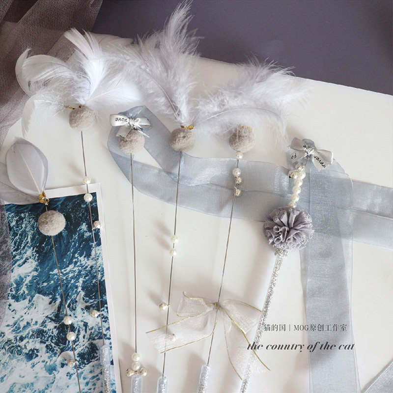 MOG light series fairy stick teasing cat stick bell feather cat toy ball tassel fighting cat stick original