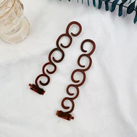 Коричневая заколка для волос