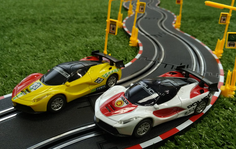 Songbao Đồ chơi 1:43 Racing Track Racing Bản gốc Rally Toy Rally Toy Electric Car đồ chơi mini