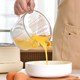 Egg beating bowl rice-drawing artifact glass egg liquid filter bowl baking filter measuring cup multifunction rice-drawing filter