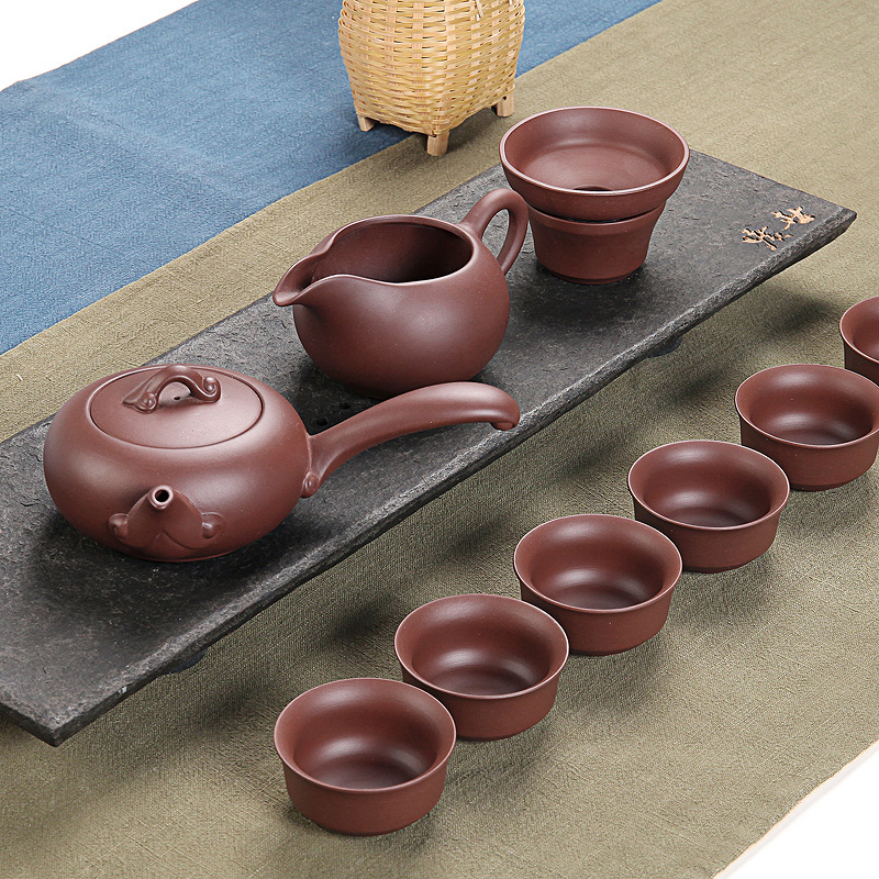 Xin yuan, yixing purple sand kung fu tea set and a half manual it undressed ore sea. A complete set of tea cups