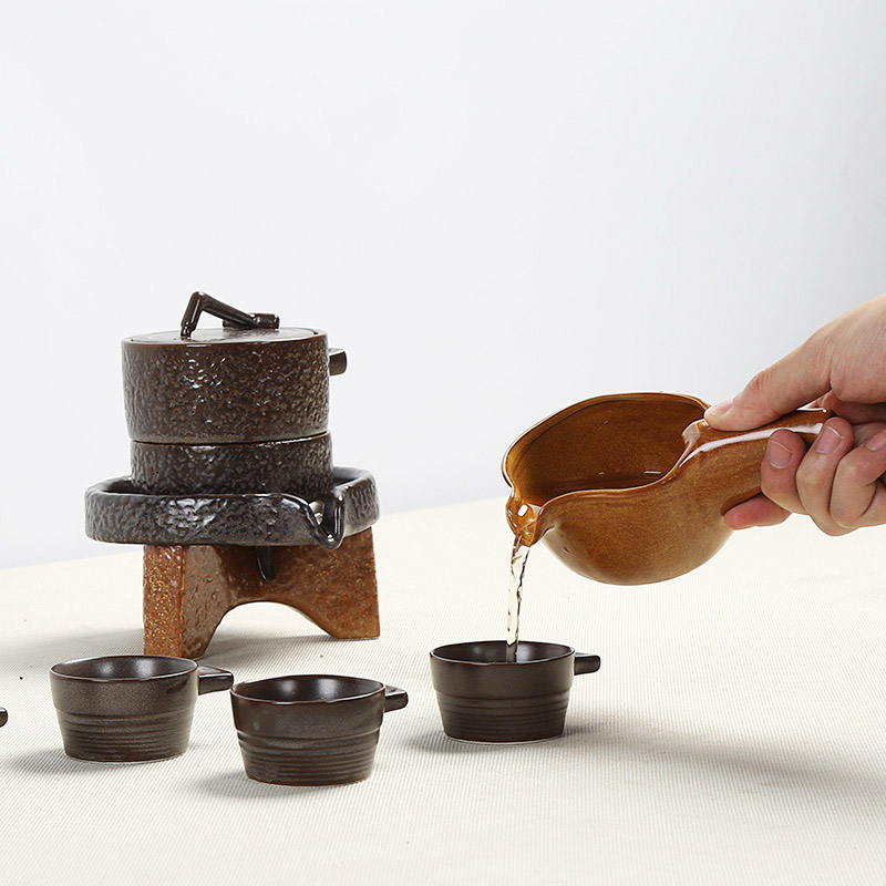 Xin arts edge automatic coarse ceramic tea set ceramic prevent hot tea, a complete set of kung fu tea sets stone mill