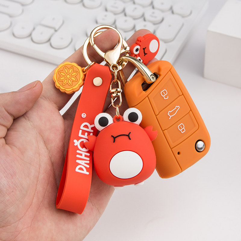Cartoon doll key cover is suitable for Foss Sagitar Tiguan Bora POLOPassat Lavida car chain buckle bag