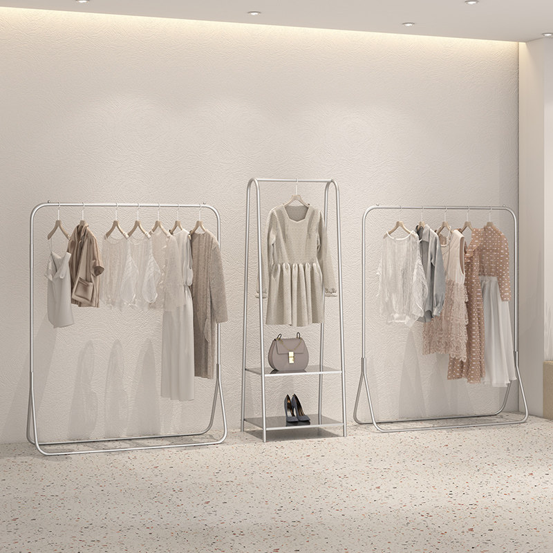 Women's clothing stores silver display rack clothing stores clothes-and-clothes rack display items on the shelves to sell clothes