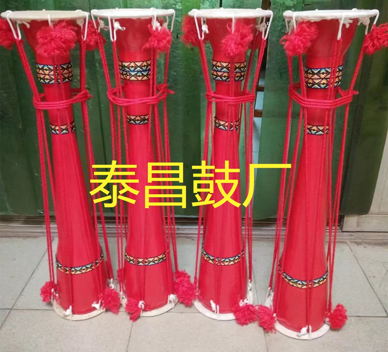 Factory direct sales of the original ecological model Liannan Yao solid wood cowhide long drum Red Yao Dayao dance drum can be customized