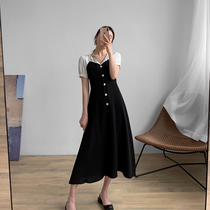 Black and white contrast mid-length V-neck dress female 2020 spring new single-breasted temperament thin retro A-line skirt