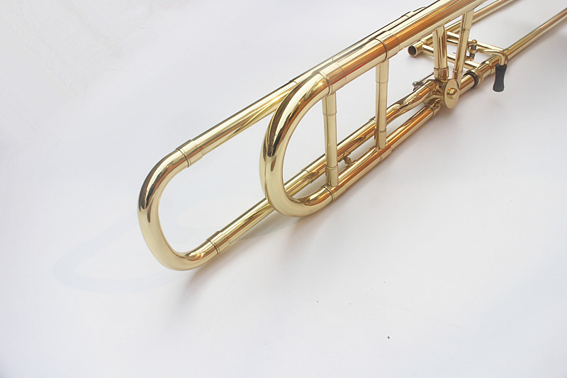 Tenor trombone B phẳng bằng đồng sơn mài vàng trombone điều chỉnh trombone one 奇 nhạc cụ phương Tây chuyên nghiệp đàn guitar mini