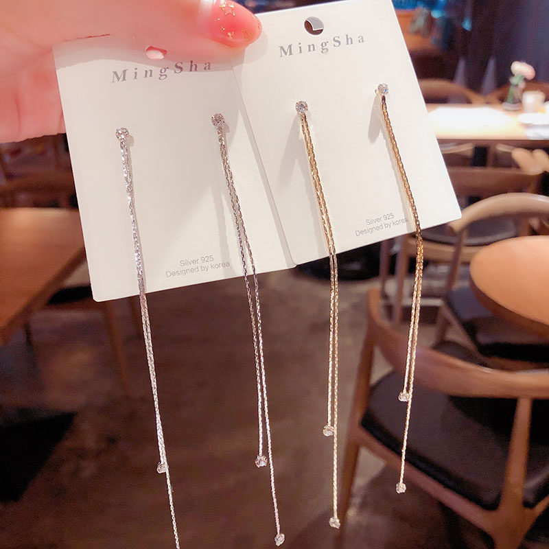 Dongdaemun fashion temperament super fairy long version of tassel earrings female personality Korean exaggerated atmospheric earrings fashion ear acupuncture