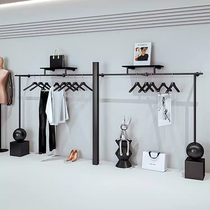 Clothing store clothes hanger display rack on the wall iron black hanging clothes bar laminate storage rack womens clothing store shelf display rack