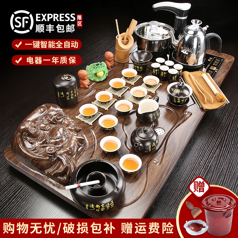 A complete set of purple sand tea kungfu tea cup set automatic water A whole home sitting room ground tea tea table