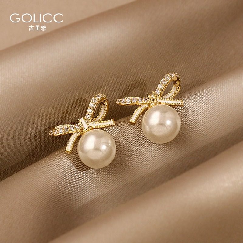 Bow small pearl earrings simple temperament female net red 2021 new fashion earrings 925 silver earrings