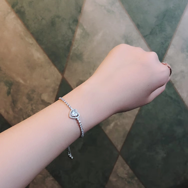 Vòng tay trái tim đào sáng tạo phiên bản Hàn Quốc của Sen hoang dã đơn giản của bạn gái thời trang vòng tay cá tính nữ trang sức vòng gỗ sưa