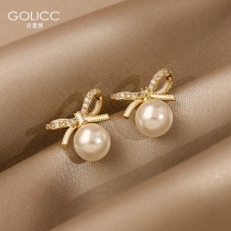 Earrings small crowddesign Feel Temperament Earrings Women Light Extravaganza Superior butterfly knot pearl ear nail 2022 New wave