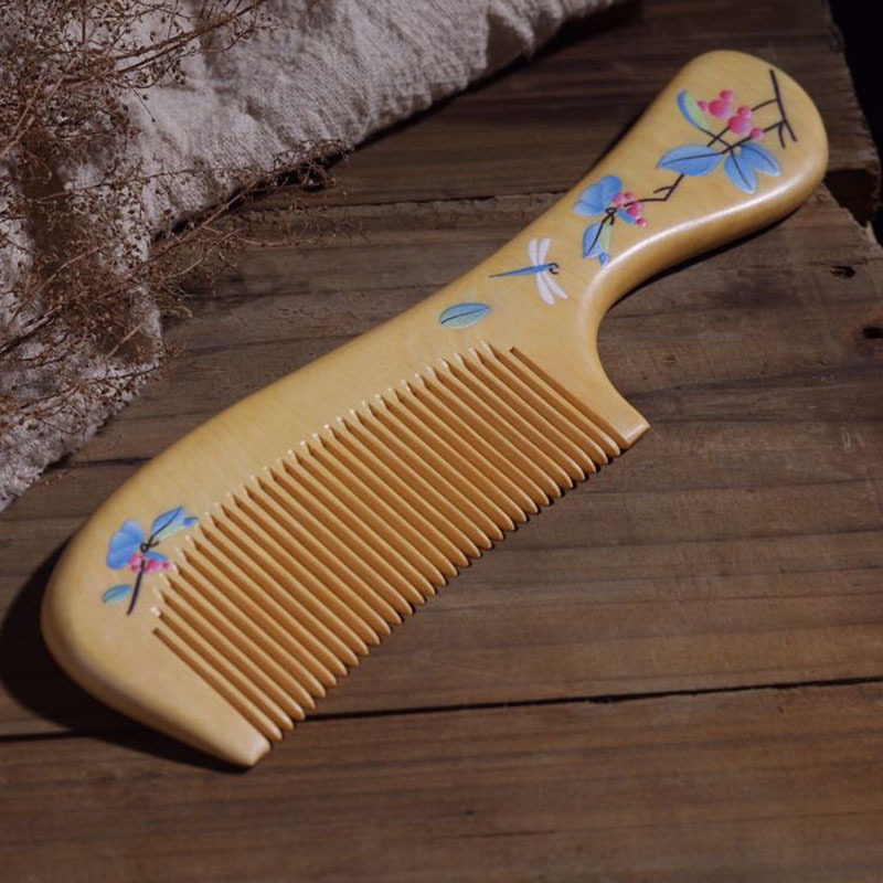 Yellow Yang wood comb painted lacquer art comb home antistatic portable comb bag comb wide teeth long hair massage lettering