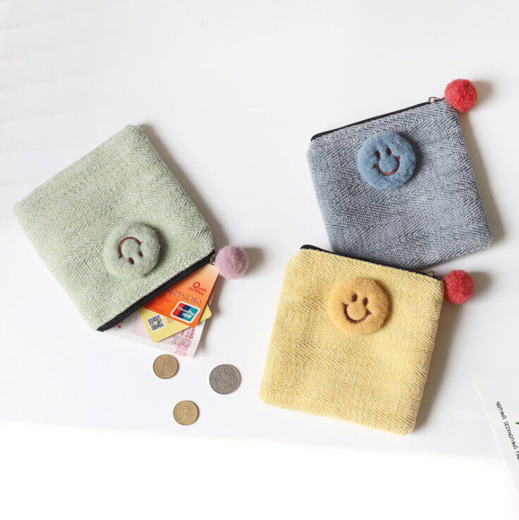 Girls smiling face purse Korean version student coin bag key bag card bag small wallet plush sanitary napkin storage bag